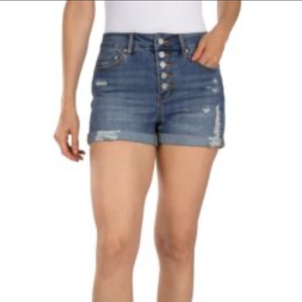 INDIGO REIN Women exposed button fly, distressed accents and a cuffed hem | 7/27